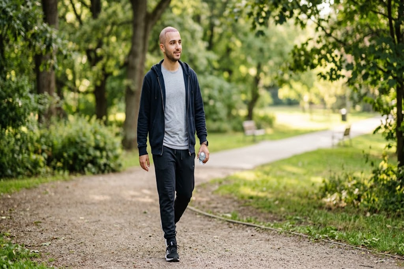 Man walking after hair transplant recovery