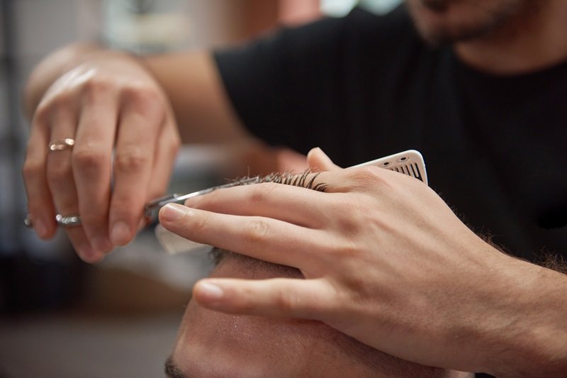 hair transplant haircut with scissors