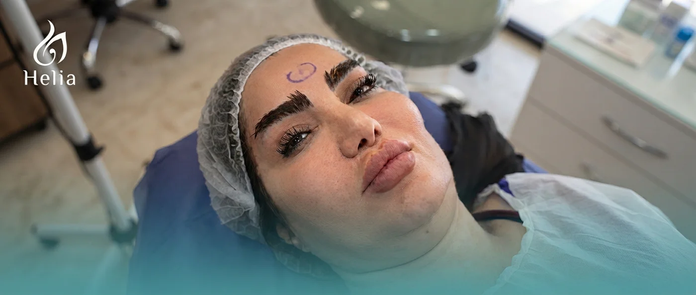 Candidate assessment for double chin liposuction at Helia Clinic Dubai.